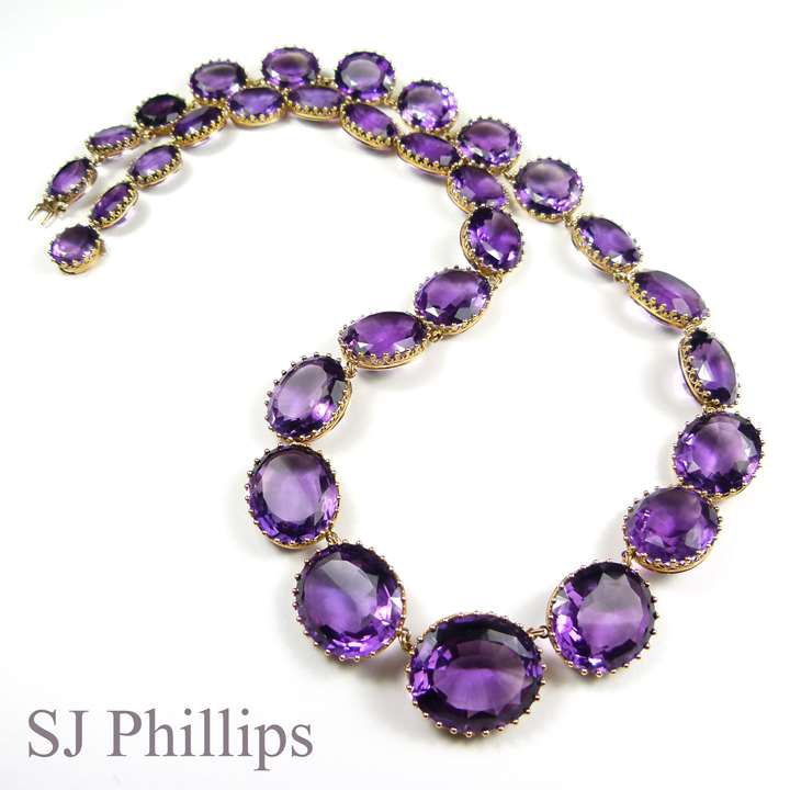 Long 19th century graduated amethyst and gold riviere necklace